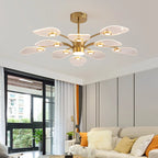 Decorative Sputnik LED chandelier with ten light bulbs, modern design by TheChandelierCo, featuring a starburst-style fixture with multiple arms.