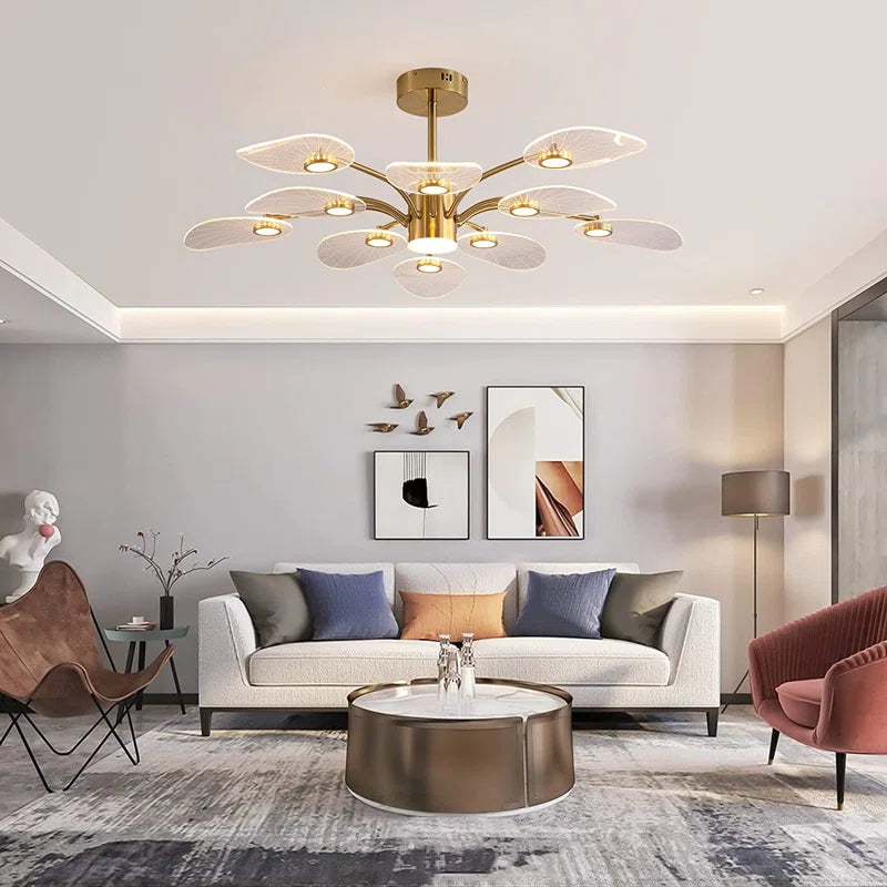 Ten-light Sputnik LED chandelier by TheChandelierCo with a modern starburst design and metal finish, hanging from a ceiling fixture.