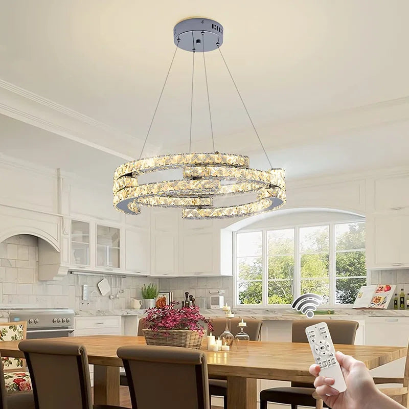 Three-light unique LED chandelier by TheChandelierCo featuring modern, statement design with sleek metal and illuminated glass accents.