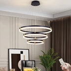 Modern 80cm tiered chandelier with three acrylic rings, dimmable LED lighting, and crystal accents, pendant ceiling light fixture.