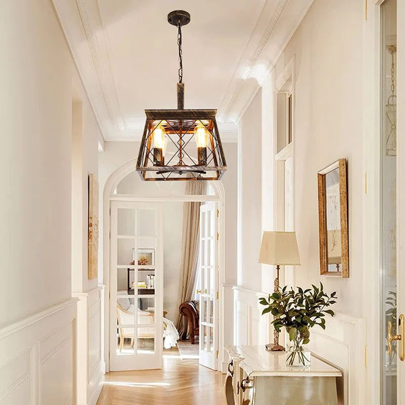 Four light bronze lantern pendant lights from TheChandelierCo, featuring classic design with warm bronze finish and clear glass shades.