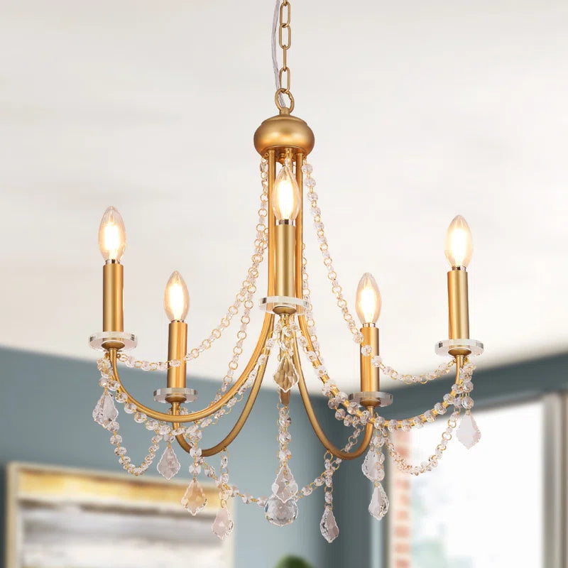 Five-light candle-style chandelier by TheChandelierCo featuring classic candle holders and elegant metal frame.