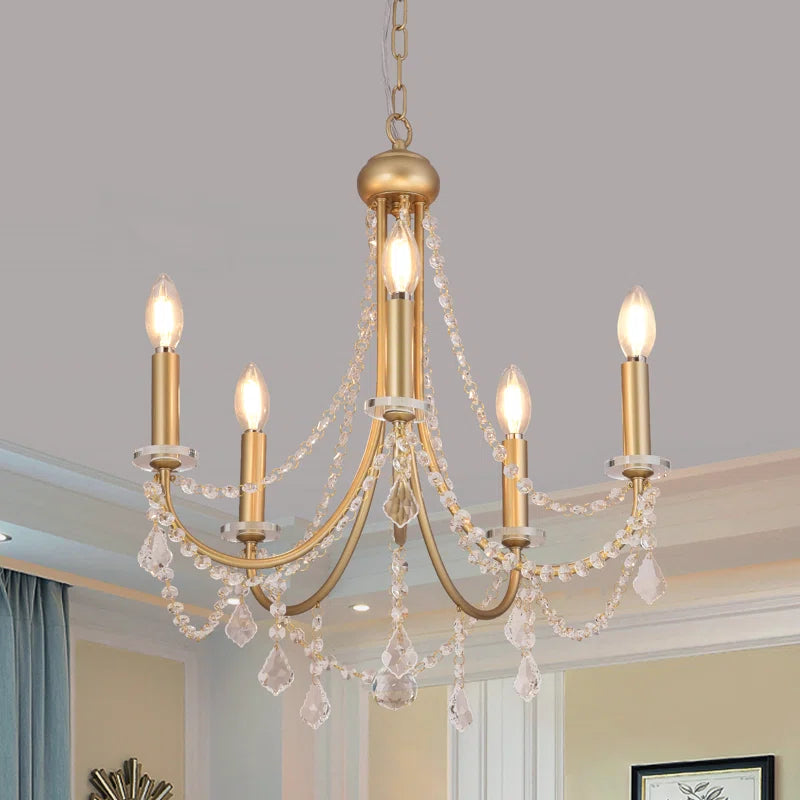 Elegant candle-style chandelier with five lights, featuring classic design and ornate details, perfect for adding charm to any space.