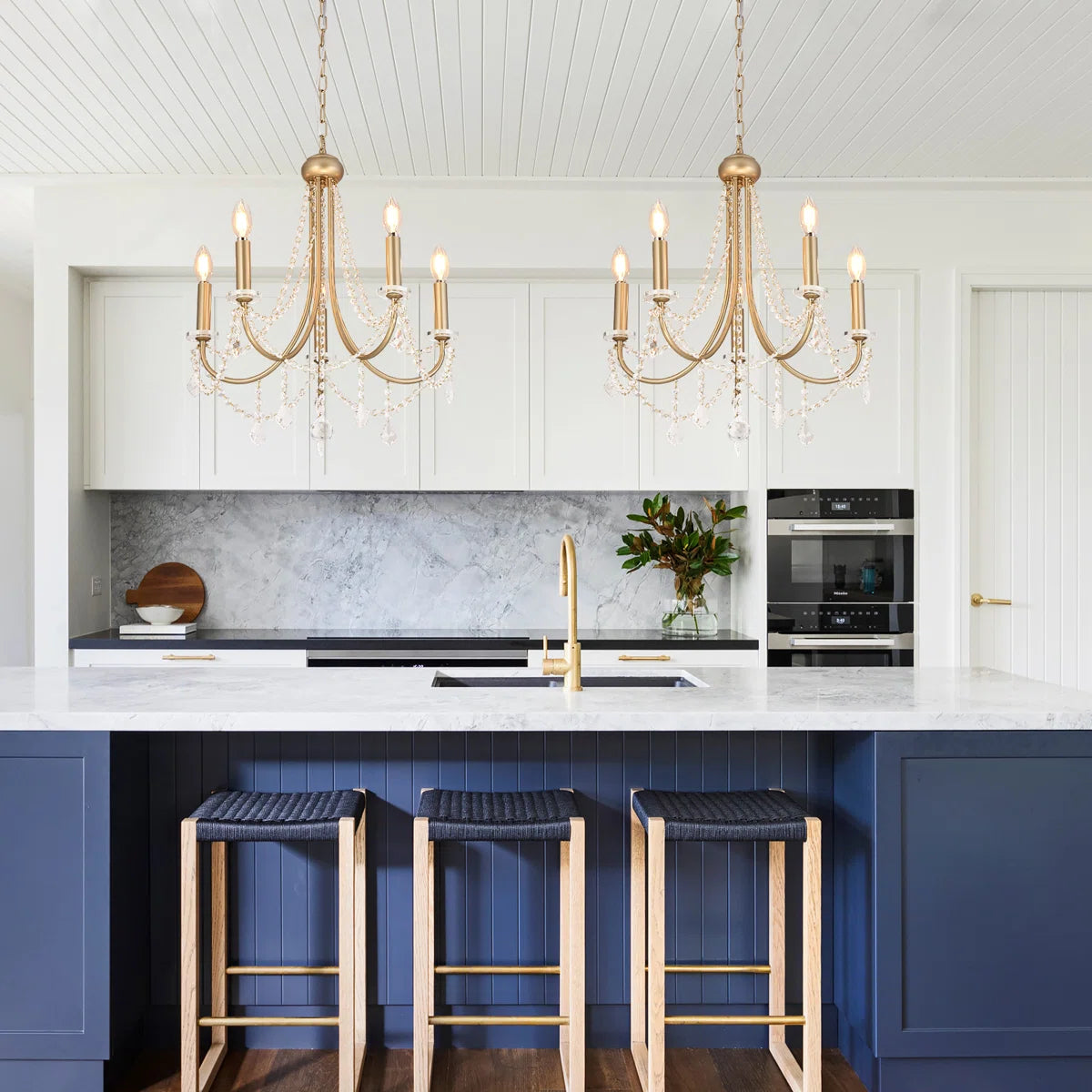 Five-light candle style chandelier by TheChandelierCo featuring elegant candle-shaped light fixtures and a classic design.
