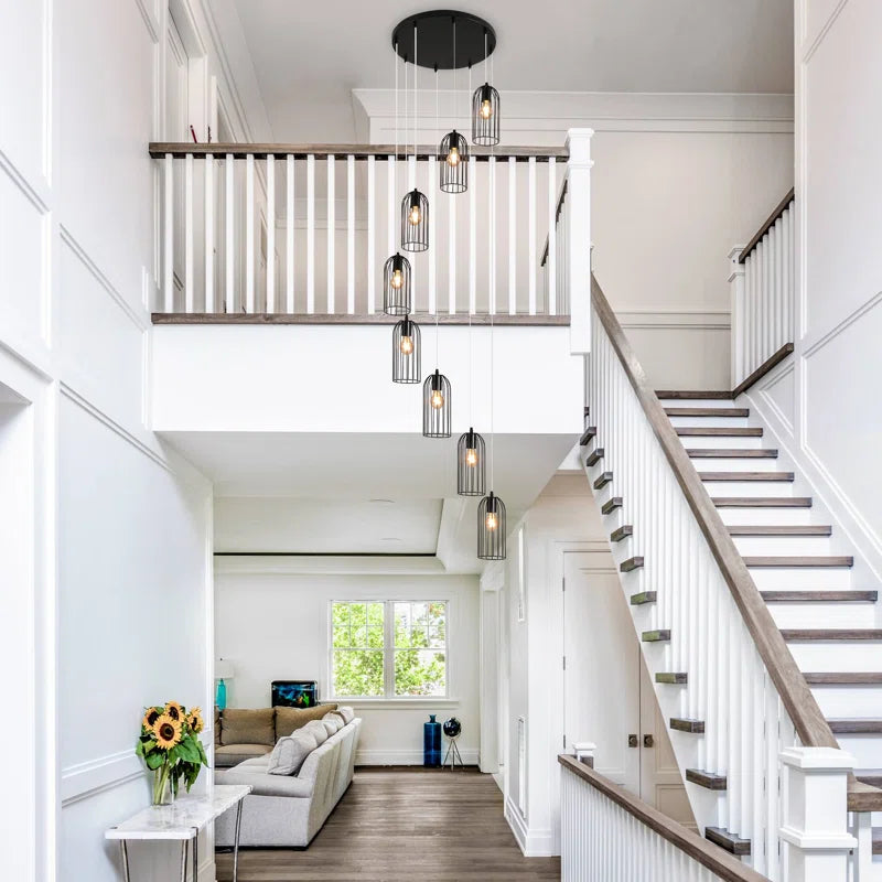 Eight-light cluster chandelier by TheChandelierCo featuring modern design with multiple glass globes and a sleek metal frame.