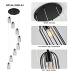 Eight-light cluster chandelier by TheChandelierCo featuring modern design with hanging glass orbs and a sleek metal frame.