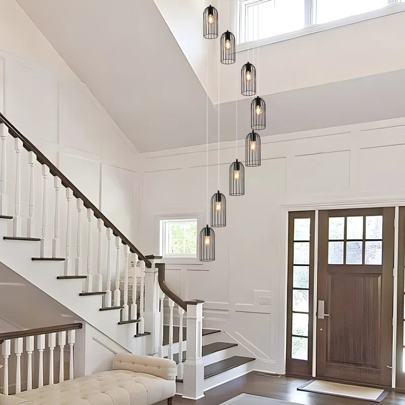 Eight-light cluster chandelier by TheChandelierCo featuring modern design with hanging glass or metal light fixtures.