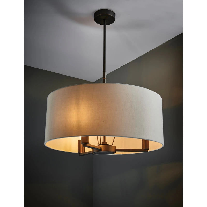 Katrina 3-light drum chandelier by TheChandelierCo featuring a modern light drum design with metal and fabric elements.
