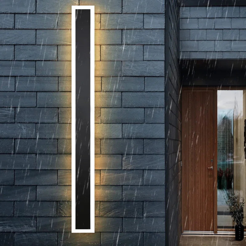 Aarti black outdoor cellar light by TheChandelierCo, mounted on a wall for outdoor illumination with a sleek black finish.