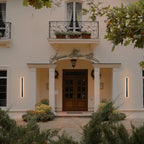 Black outdoor cellar light by TheChandelierCo, featuring a sleek design with a clear glass cover and metal frame for outdoor illumination.