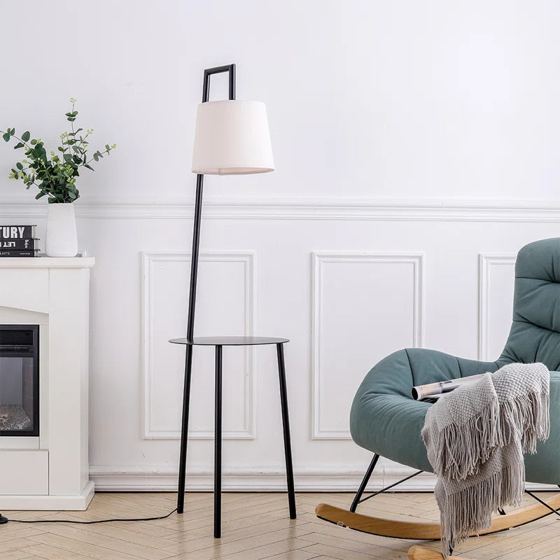 Abhirami black metal tray table floor lamp with linen lampshade, 150cm tall, modern design, featuring a circular tray base and soft lighting.