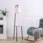 Abhirami black metal tray table floor lamp with linen lampshade, 150cm tall, modern design, featuring a circular tray base and soft lighting.