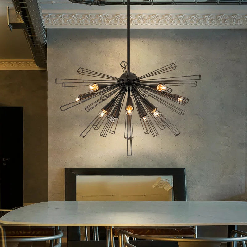 Modern Akzel 10 light pendant by TheChandelierCo with sleek metal frame and clear glass shades hanging from a ceiling mount.
