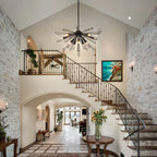Akzel 10 light pendant from TheChandelierCo featuring a sleek modern design with multiple hanging light bulbs.