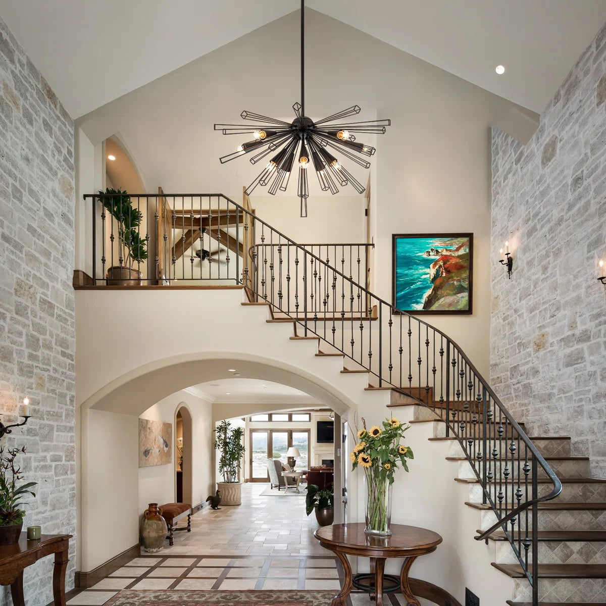 Akzel 10 light pendant from TheChandelierCo featuring a sleek modern design with multiple hanging light bulbs.