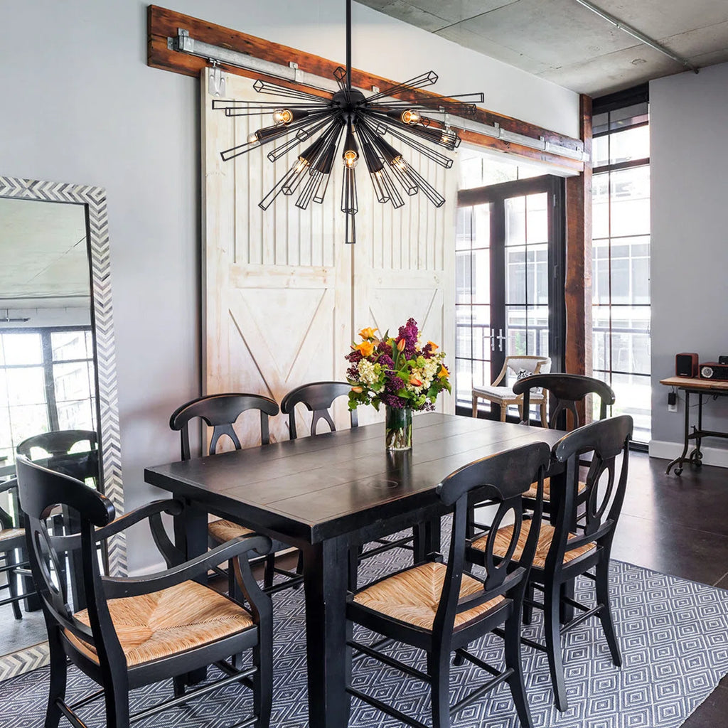 Elegant Akzel 10 light pendant by TheChandelierCo featuring a modern design with a sleek glass shade and metallic finish.