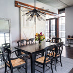 Elegant Akzel 10 light pendant by TheChandelierCo featuring a modern design with a sleek glass shade and metallic finish.