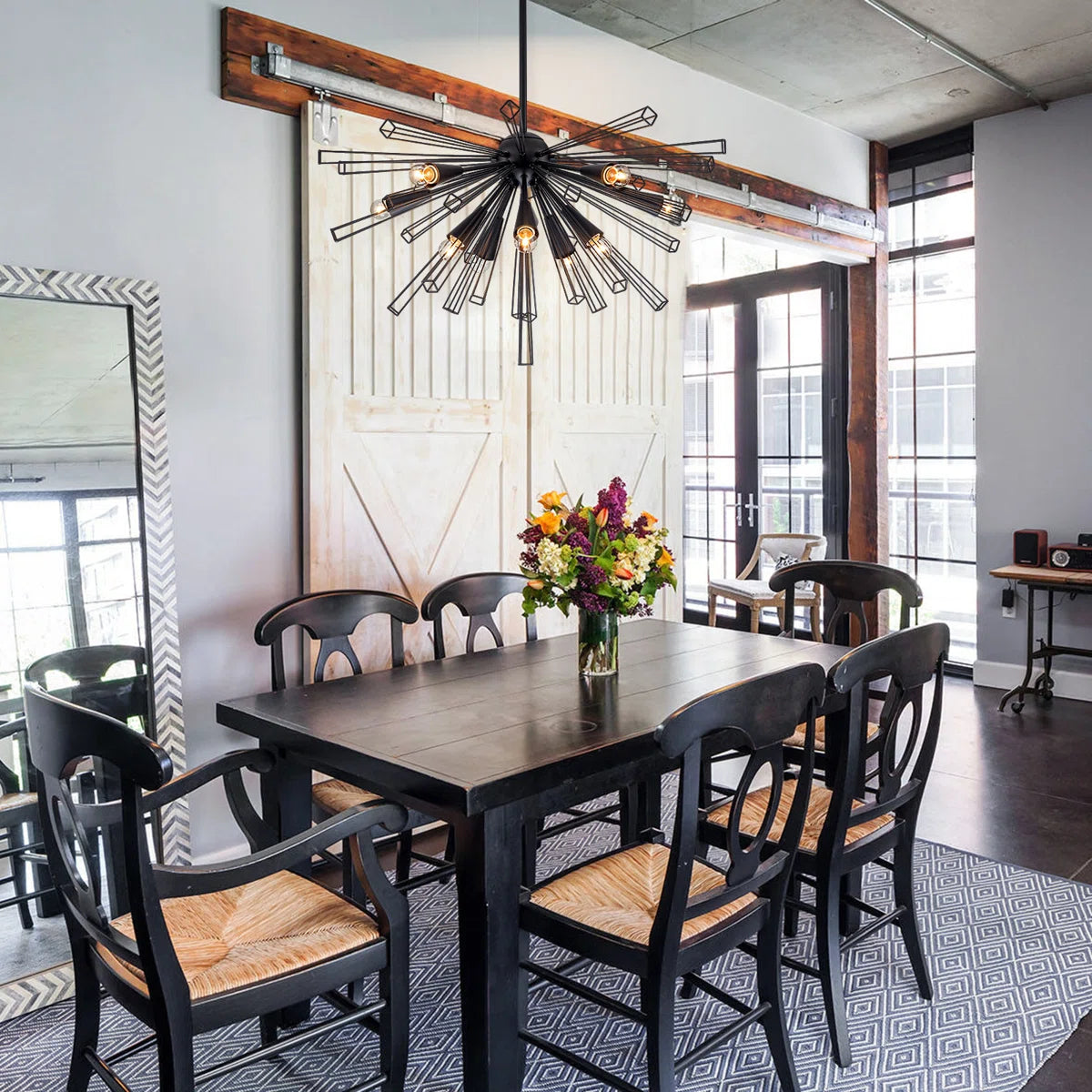 Elegant Akzel 10 light pendant by TheChandelierCo featuring a modern design with a sleek glass shade and metallic finish.