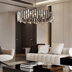 Alfaigh modern geometric crystal chandelier with 14 lights, black finish, and adjustable chain, hanging as a stylish interior lighting fixture.