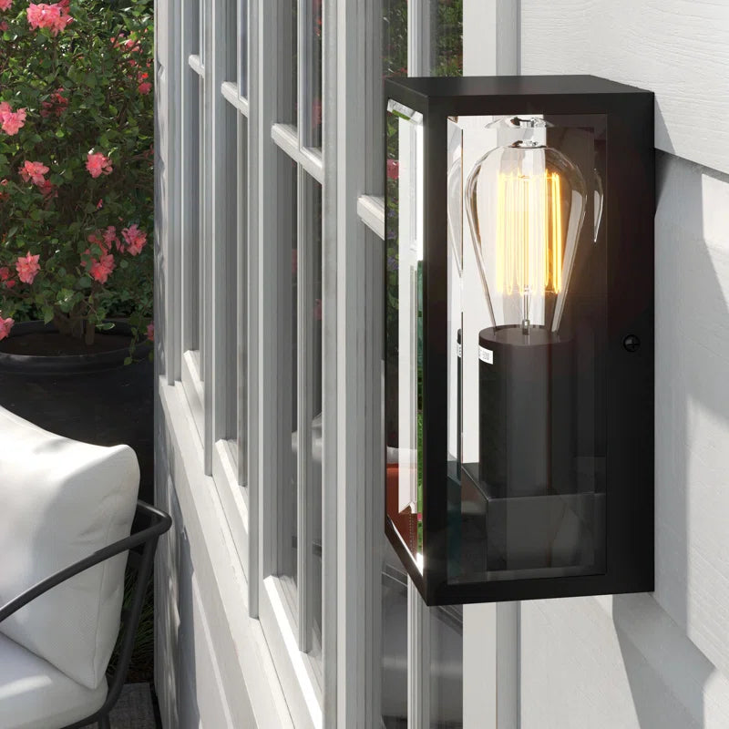 Black outdoor flush mount light fixture by TheChandelierCo, 23.5cm tall with a modern design, suitable for exterior lighting.