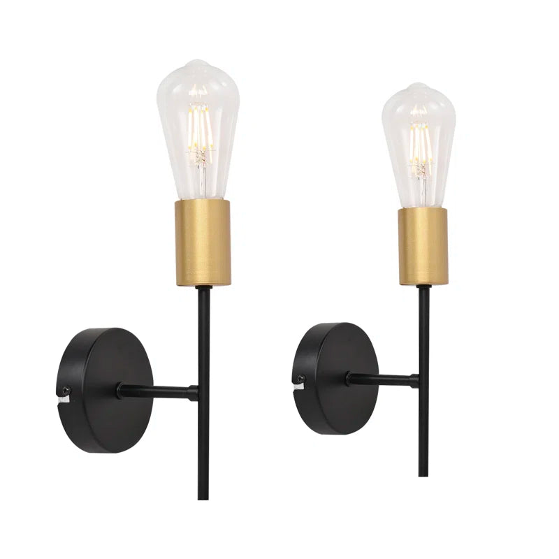 Set of two Ambellina iron armed sconces with classic design, featuring ornate metal arms and candle-style light fixtures.
