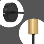 Set of two Ambellina iron armed sconces with vintage-style candle holders and ornate detailing for classic wall lighting.