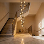 Light silver cluster pendant from the Amice 15 collection by TheChandelierCo, featuring multiple hanging crystal elements.
