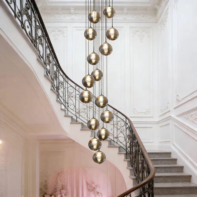 Light silver cluster pendant from the Amice 15 collection by TheChandelierCo, featuring multiple sparkling crystal bulbs.