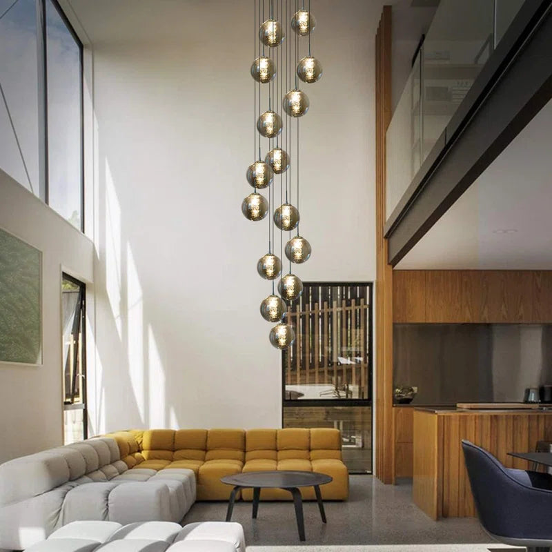 Light silver cluster pendant from TheChandelierCo's Amice 15 collection, featuring a delicate, elegant design with multiple hanging silver elements.