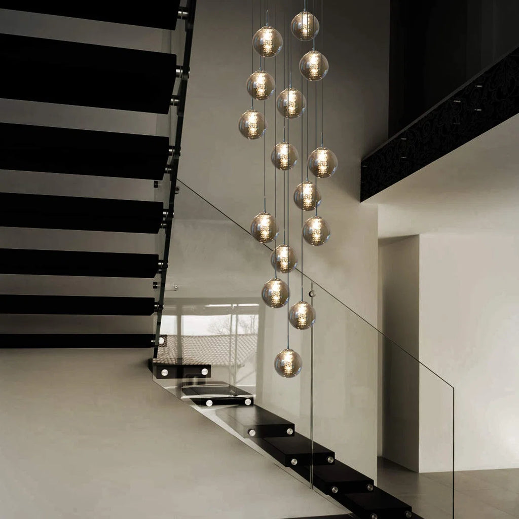 Light silver cluster pendant from the Amice 15 collection by TheChandelierCo, shown hanging with intricate design details.