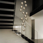 Light silver cluster pendant from the Amice 15 collection by TheChandelierCo, shown hanging with intricate design details.