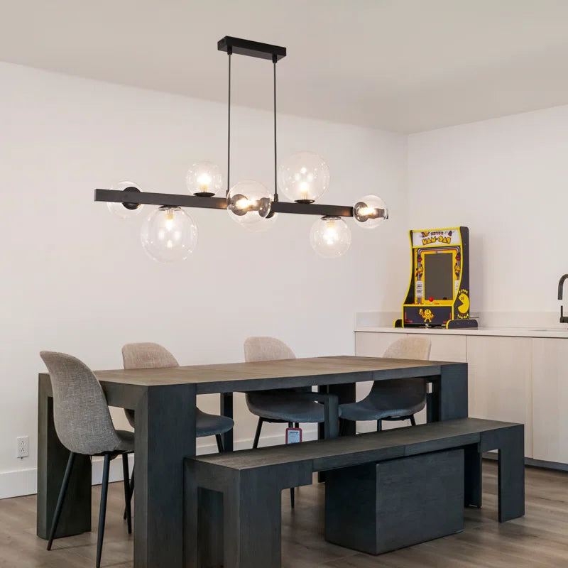Light matte black sphere pendant light from the Ammanda 8 collection by TheChandelierCo, featuring a sleek modern design.