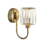 Steel and glass armed sconce by TheChandelierCo featuring a modern design with a sleek metal arm and clear glass shade.