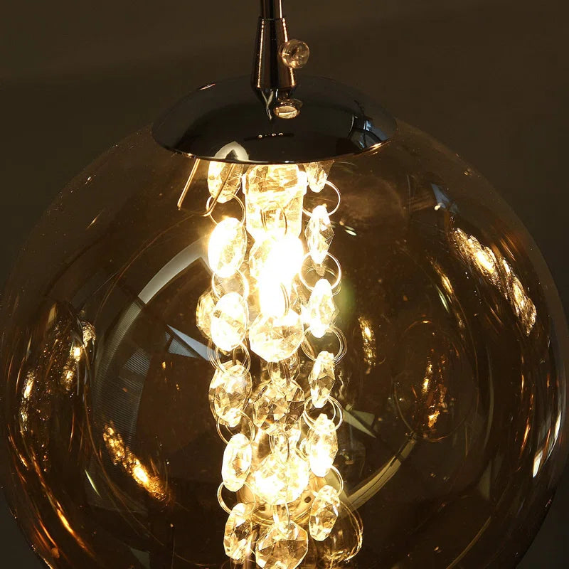 Ariya 4 Light Schwarz unique statement pendant by TheChandelierCo hanging with modern black design and intricate detailing.