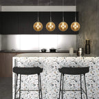 Ariya 4 Light Schwarz unique statement pendant light by TheChandelierCo hanging with modern design and sleek black finish.