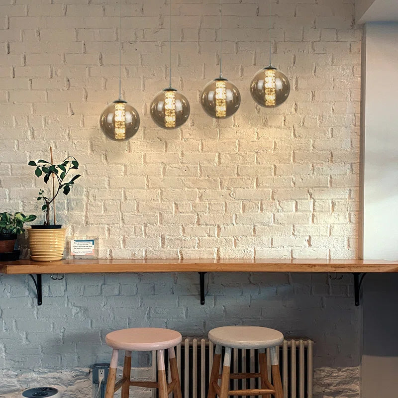 Black LED pendant light chandelier with four glass shades, height-adjustable design by TheChandelierCo, modern statement lighting fixture