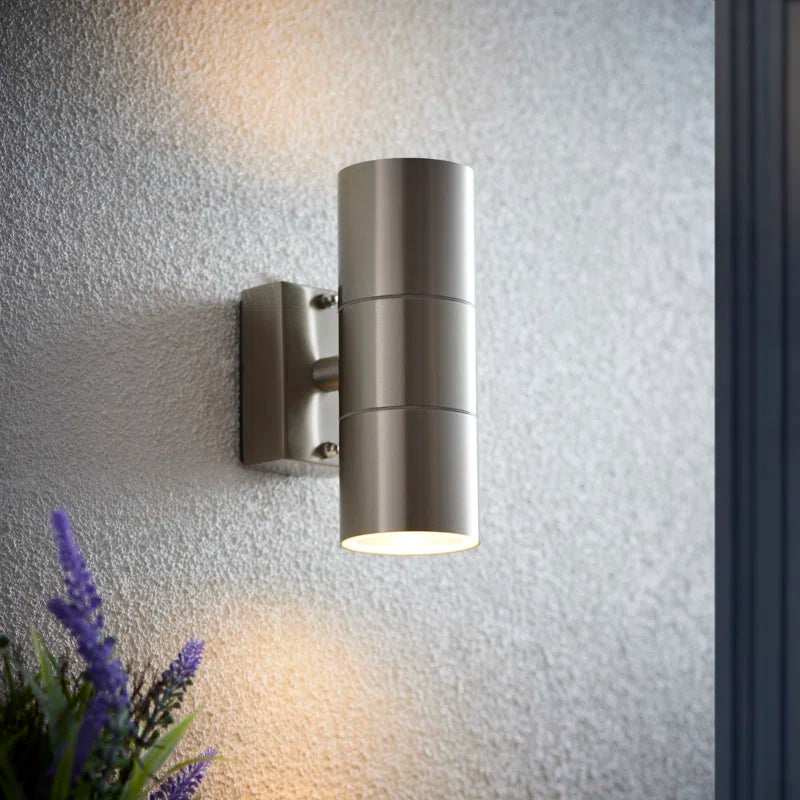 Silver Arney 2 outdoor armed sconce with a 16.5cm bulb, featuring a classic design and durable metal construction.