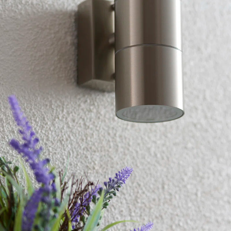 Silver outdoor armed sconce with a 16.5cm bulb and classic design, perfect for exterior lighting applications.