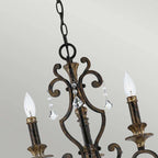 Elegant Banville 3 light candle-style chandelier by TheChandelierCo featuring classic candle holders and a stylish metal frame.