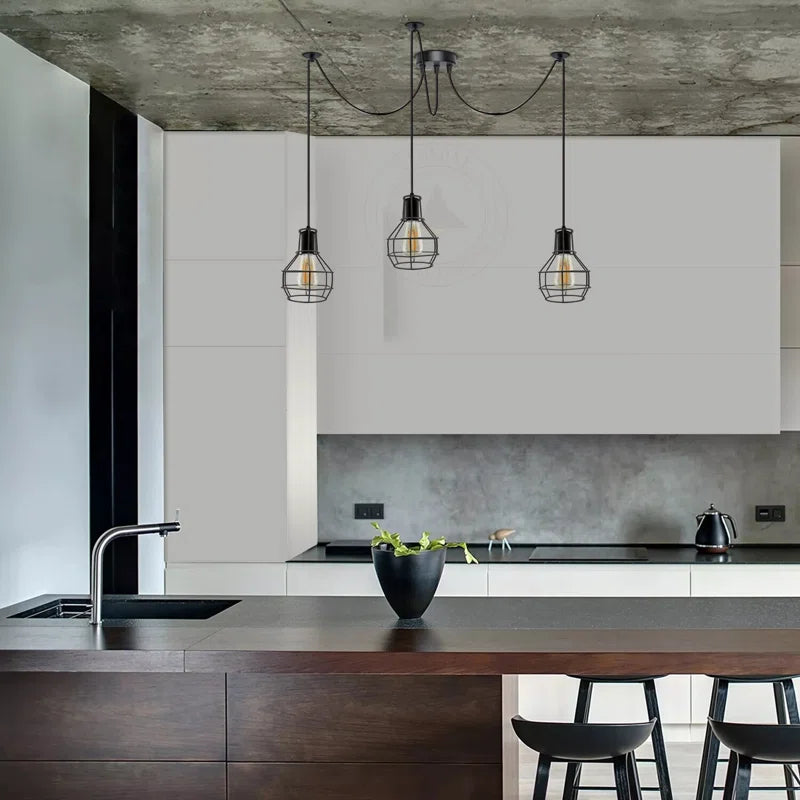 Elegant Barner 3 light chandelier by TheChandelierCo featuring a modern design with multiple hanging light fixtures.