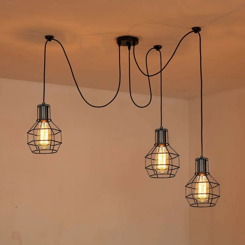 Elegant Barner 3 light chandelier by TheChandelierCo featuring multiple hanging light fixtures with a modern design.