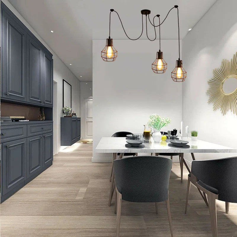 Elegant Barner 3 light chandelier by TheChandelierCo with multiple glass shades and modern design for stylish interior lighting.