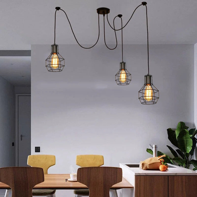 Elegant Barner 3 light chandelier by TheChandelierCo with multiple hanging lights and a sleek modern design.