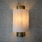 Set of two Beedle flush mounted sconces by TheChandelierCo, featuring modern design with frosted glass shades and brushed metal finishes.