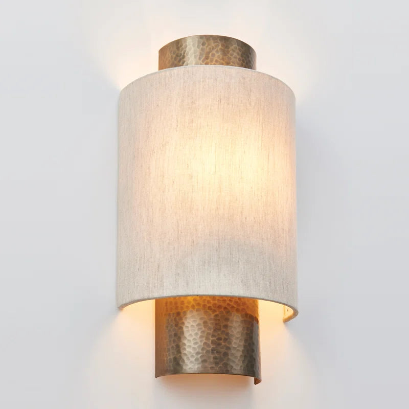 Set of two Beedle flush mounted sconces by TheChandelierCo with brass finish and modern design, wall-mounted lighting fixtures.