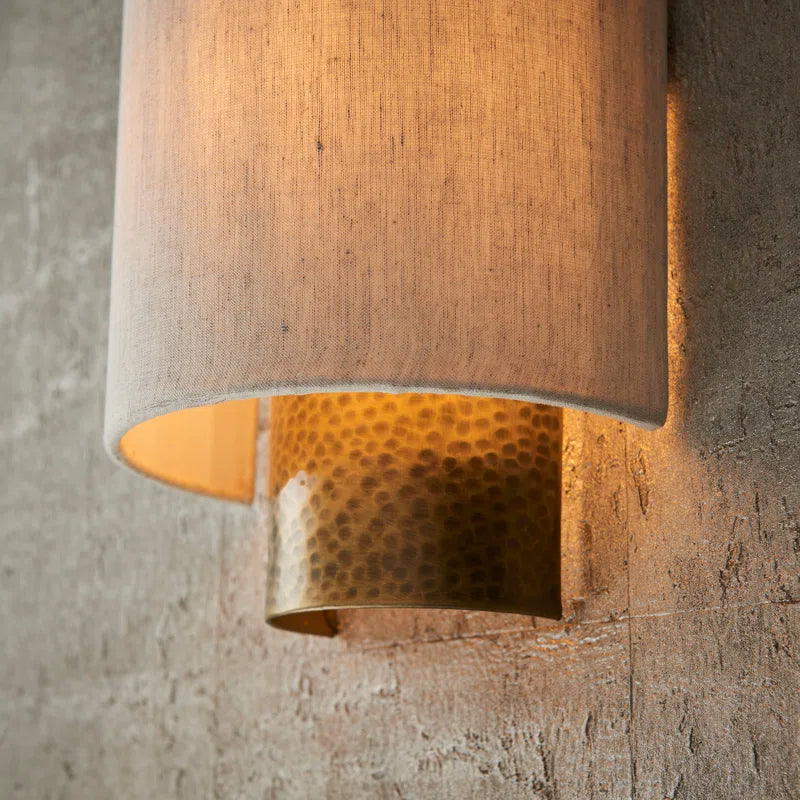 Set of two Beedle flush-mounted sconces by TheChandelierCo featuring modern design with frosted glass shades and sleek metal finishes