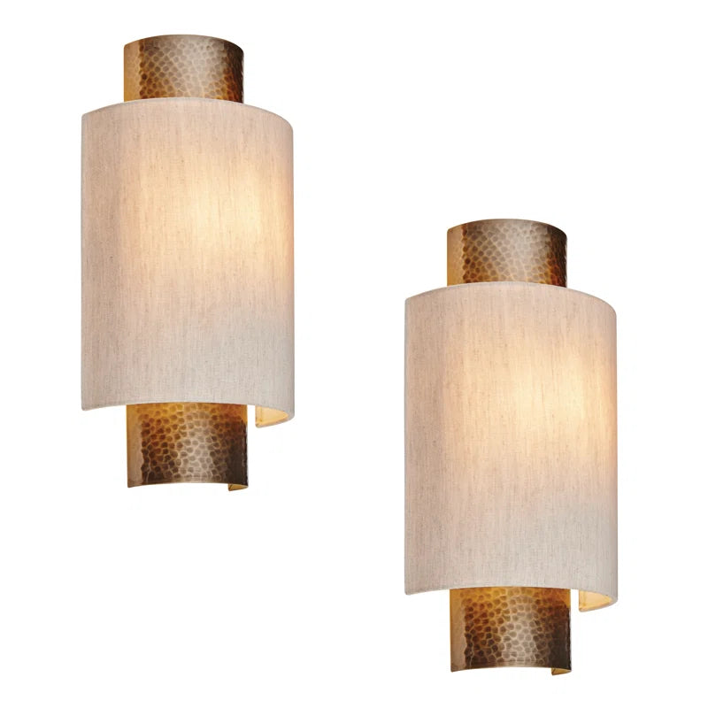 Set of two Beedle flush mounted sconces by TheChandelierCo featuring modern design with round glass shades and sleek metal bases.