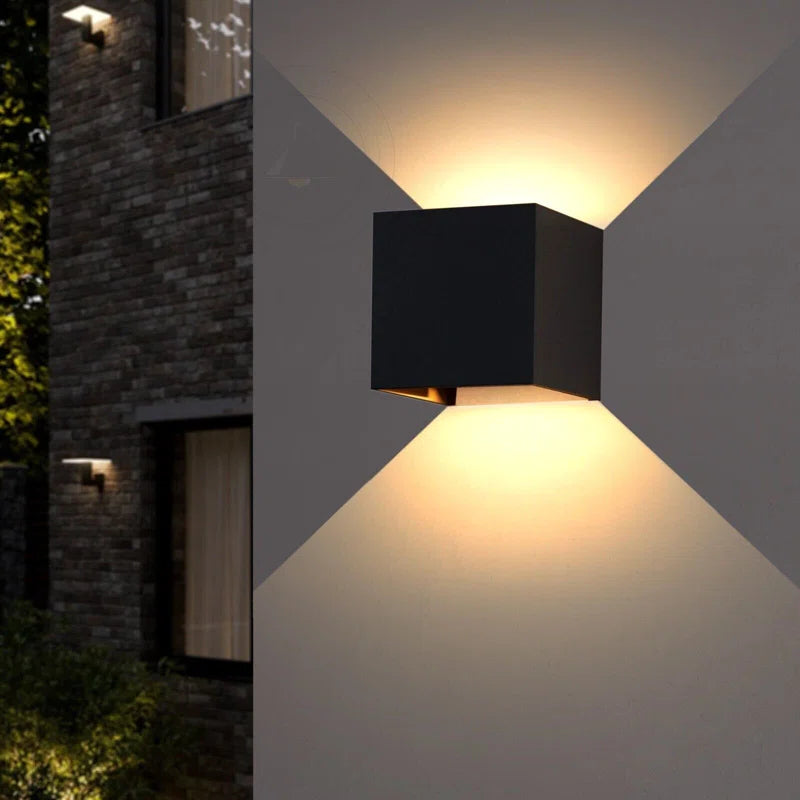 Black Betheny outdoor LED sconce by TheChandelierCo, featuring a sleek 10cm modern design with integrated lighting.