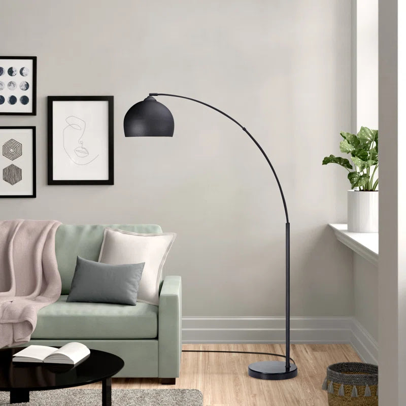 Bonita Arquer 66.93-inch black arc floor lamp with faux black marble base and black bell shade, modern lighting design.