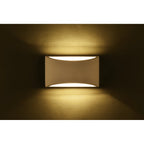 Blandford flush mounted sconce by TheChandelierCo, featuring a sleek design with a polished metal finish and glass shade.